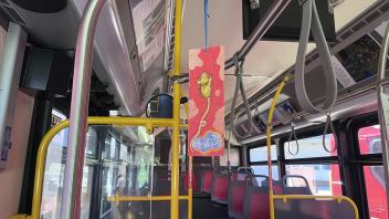 Art Hanger on bus