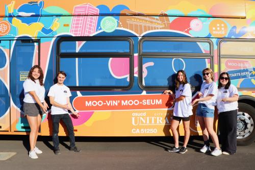 Curators Posing In Front of Moo-seum